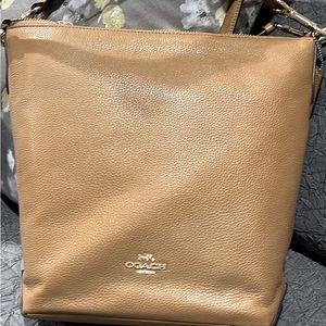 Coach handbag. New with tags. Leather.